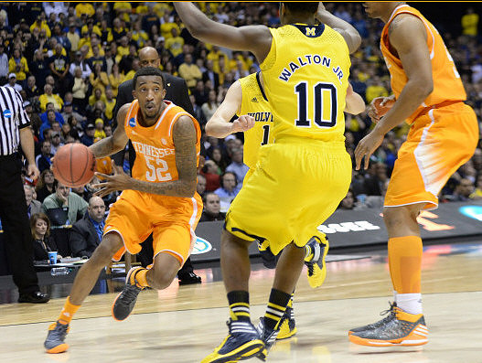 Derrick Walton Jr. (10) and Nik Stauskas (11)