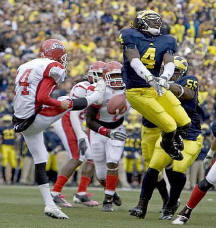 Brandon Smith (4) and Brandon Graham (55)