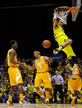 Jordan Morgan (52) and John Beilein