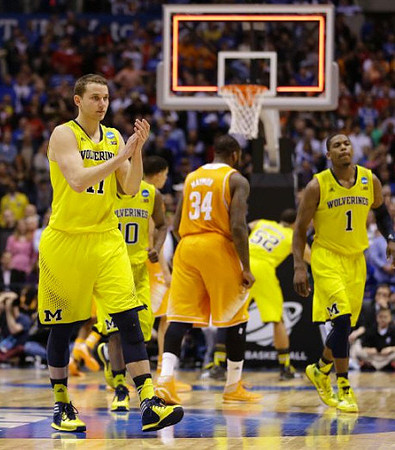 Nik Stauskas (11), Derrick Walton Jr. (10), Jordan Morgan (52), and Glenn Robinson III (1)