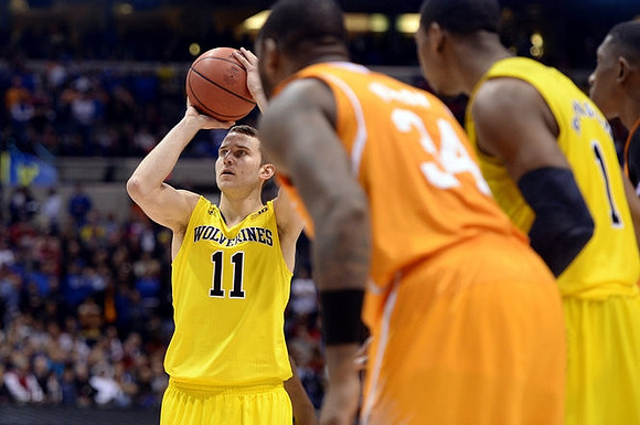 Nik Stauskas (11) and Glenn Robinson III (1)
