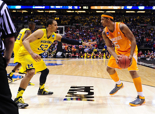 Jordan Morgan (52) and Caris LeVert (23)