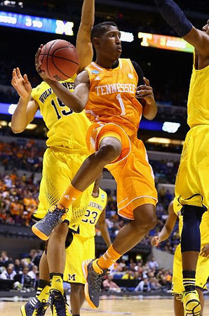 Jon Horford (15), Caris LeVert (23), and Glenn Robinson III (1)
