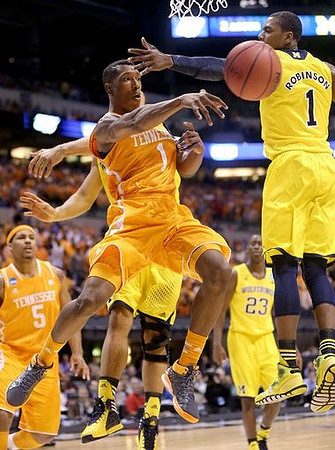 Glenn Robinson III (1) and Caris LeVert (23)