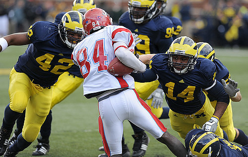 J.B. Fitzgerald (42), Teric Jones (14), and Adam Patterson (99)