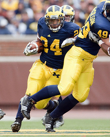 Tate Forcier (5), Kevin Grady (24), and John McColgan (49)