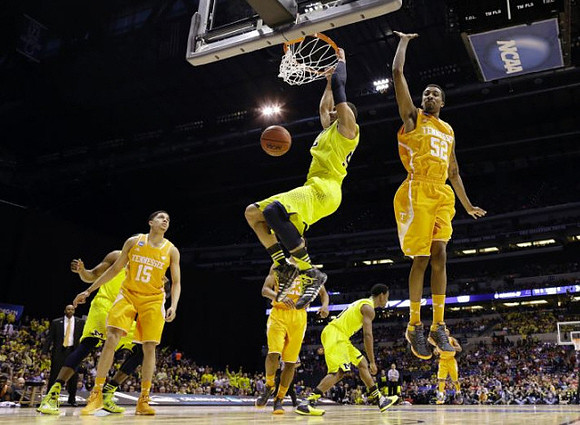 Jordan Morgan (52) and Derrick Walton Jr. (10)