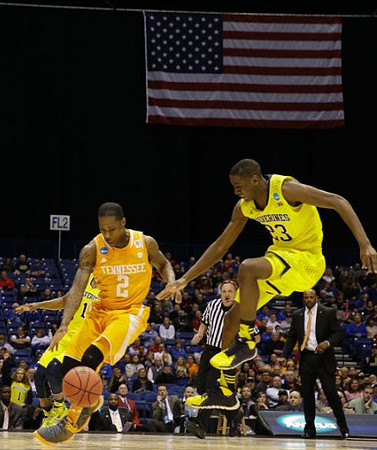 Caris LeVert (23) and Glenn Robinson III (1)