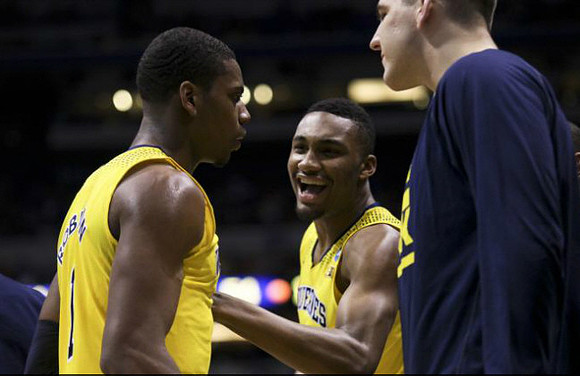 Glenn Robinson III (1), Zak Irvin (21), and Mitch McGary (4)