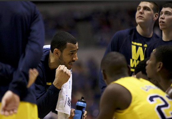Jon Horford (15), Caris LeVert (23), Glenn Robinson III (1), Mitch McGary (4), and Sean Lonergan (20)