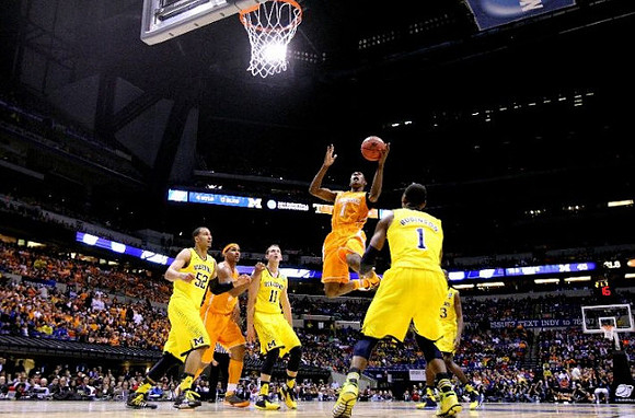 Jordan Morgan (52), Nik Stauskas (11), Glenn Robinson III (1), and Caris LeVert (23)