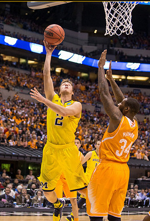 Spike Albrecht (2) and Nik Stauskas (11)