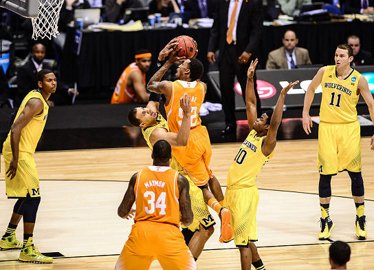Glenn Robinson III (1), Jordan Morgan (52), Derrick Walton Jr. (10), and Nik Stauskas (11)