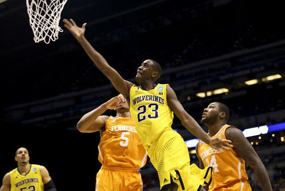 Jordan Morgan (52) and Caris LeVert (23)