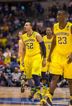 Jordan Morgan (52), Nik Stauskas (11), Glenn Robinson III (1), and Caris LeVert (23)