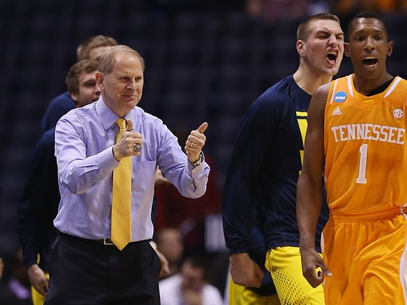 John Beilein, Spike Albrecht (2), and Mitch McGary (4)