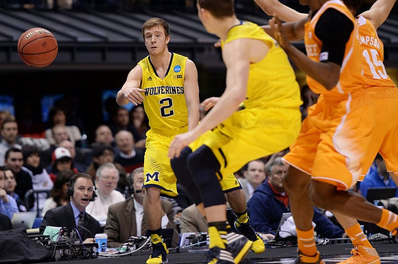 Spike Albrecht (2) and Nik Stauskas (11)