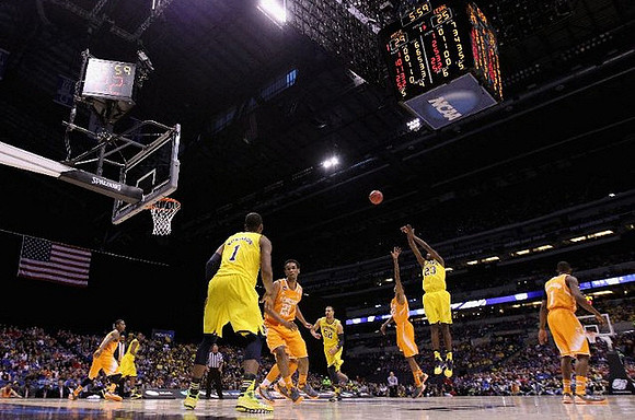 Derrick Walton Jr. (10), Glenn Robinson III (1), Jordan Morgan (52), and Caris LeVert (23)