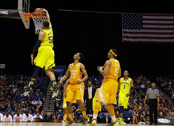Jordan Morgan (52) and Glenn Robinson III (1)