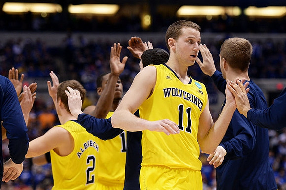 Spike Albrecht (2), Glenn Robinson III (1), and Nik Stauskas (11)