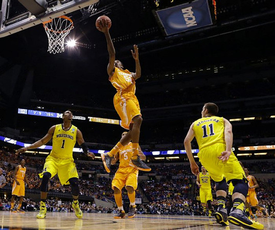 Glenn Robinson III (1), Nik Stauskas (11), and Jordan Morgan (52)
