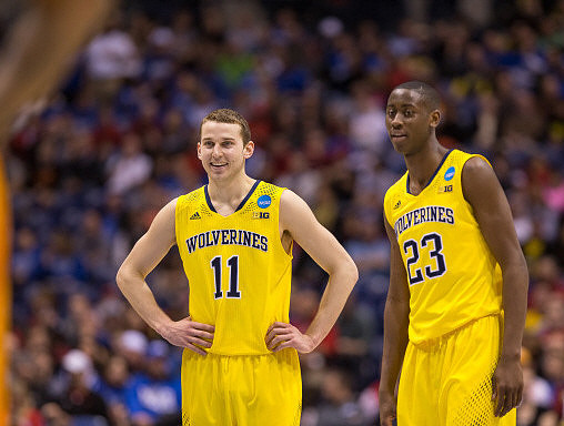 Nik Stauskas (11) and Caris LeVert (23)