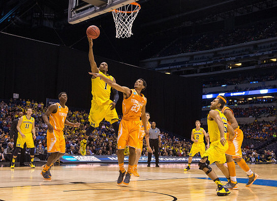 Nik Stauskas (11), Glenn Robinson III (1), Spike Albrecht (2), and Jon Horford (15)