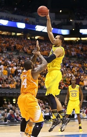 Jordan Morgan (52) and Caris LeVert (23)