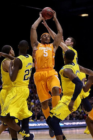 Jordan Morgan (52), Caris LeVert (23), Nik Stauskas (11), and Glenn Robinson III (1)