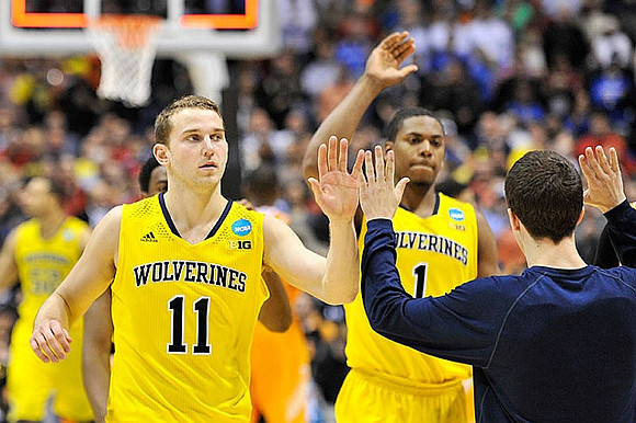 Nik Stauskas (11) and Glenn Robinson III (1)