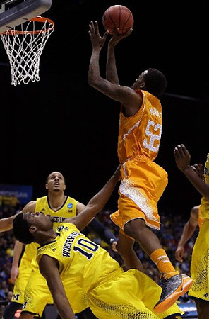 Derrick Walton Jr. (10) and Jordan Morgan (52)