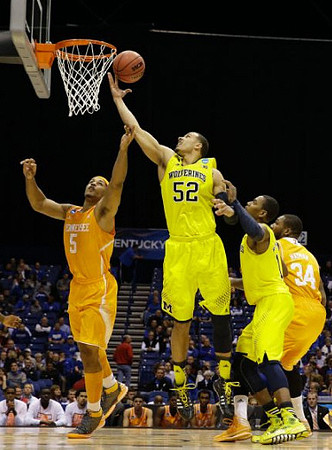 Jordan Morgan (52) and Glenn Robinson III (1)
