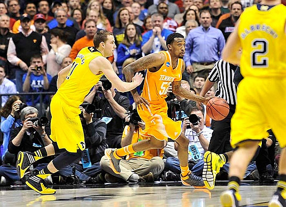 Nik Stauskas (11) and Spike Albrecht (2)