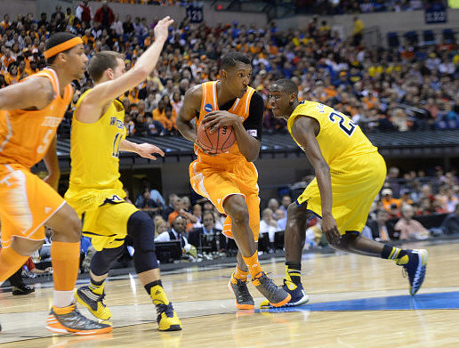 Nik Stauskas (11) and Caris LeVert (23)