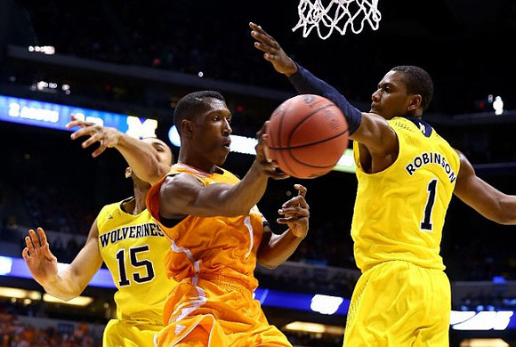 Jon Horford (15) and Glenn Robinson III (1)