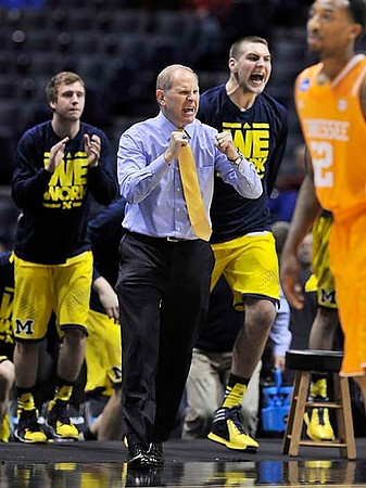John Beilein, Spike Albrecht (2), and Mitch McGary (4)