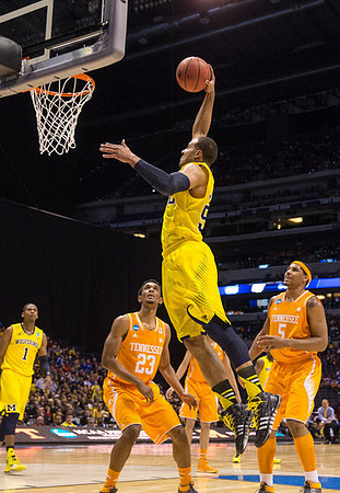 Glenn Robinson III (1) and Jordan Morgan (52)