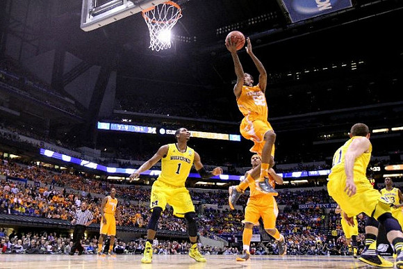 Glenn Robinson III (1), Nik Stauskas (11), and Caris LeVert (23)