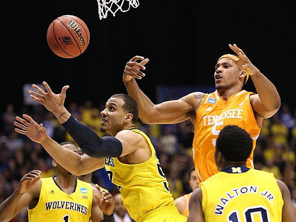 Glenn Robinson III (1), Jordan Morgan (52), and Derrick Walton Jr. (10)