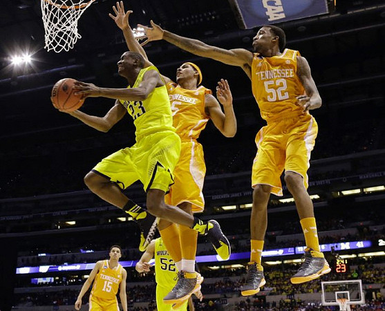 Caris LeVert (23) and Jordan Morgan (52)