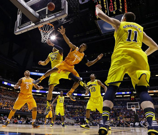 Jordan Morgan (52), Caris LeVert (23), Derrick Walton Jr. (10), and Nik Stauskas (11)
