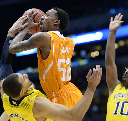 Jordan Morgan (52) and Derrick Walton Jr. (10)