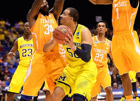 Caris LeVert (23) and Jordan Morgan (52)