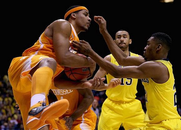 Jon Horford (15) and Zak Irvin (21)