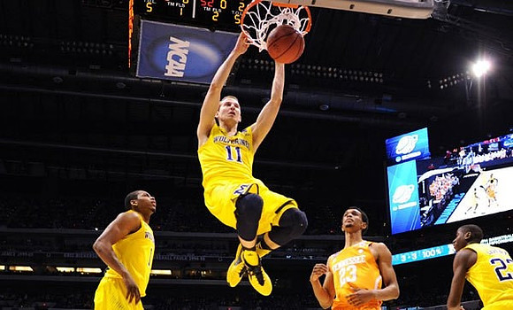 Glenn Robinson III (1), Nik Stauskas (11), and Caris LeVert (23)