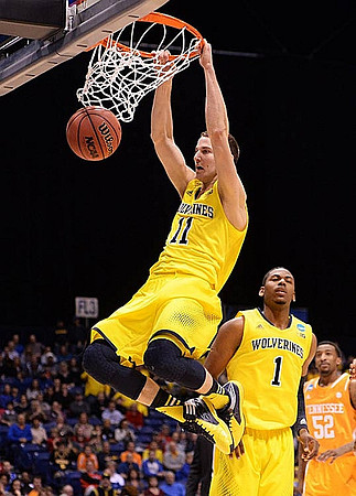 Nik Stauskas (11) and Glenn Robinson III (1)