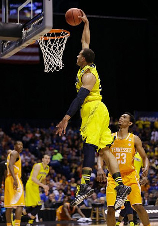 Jordan Morgan (52) and Nik Stauskas (11)