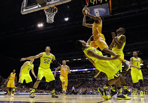 Nik Stauskas (11), Jordan Morgan (52), Derrick Walton Jr. (10), Caris LeVert (23), and Glenn Robinson III (1)