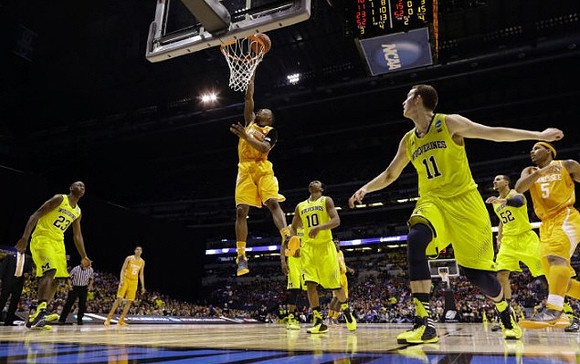 Caris LeVert (23), Derrick Walton Jr. (10), Nik Stauskas (11), and Jordan Morgan (52)