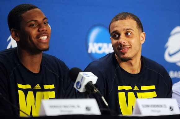 Glenn Robinson III (1) and Jordan Morgan (52)